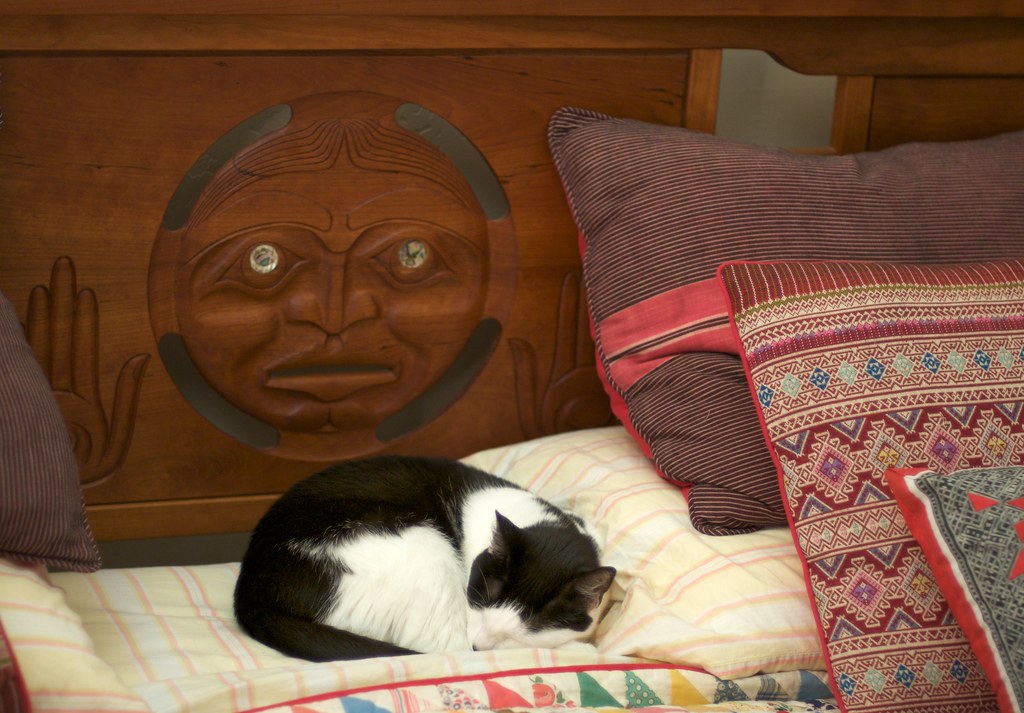 Woman sleeping peacefully in bed, representing magnesium glycinate vs citrate for sleep benefits