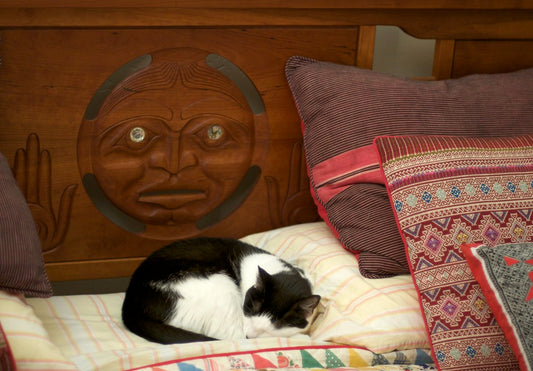 Woman sleeping peacefully in bed, representing magnesium glycinate vs citrate for sleep benefits