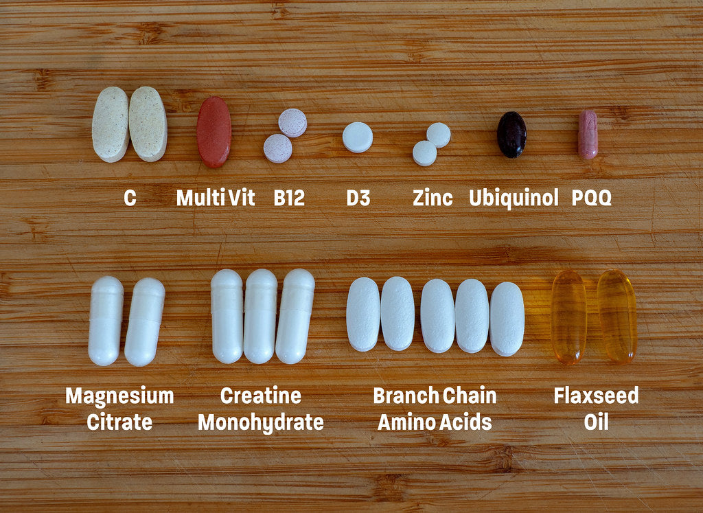 Biotin 10000 mcg capsules for hair growth on a kitchen table with natural light