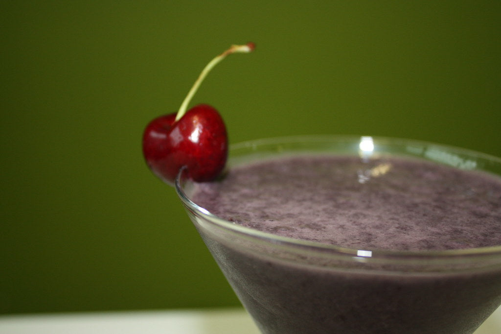 Pea protein powder in a jar with a scoop, UK supplement review