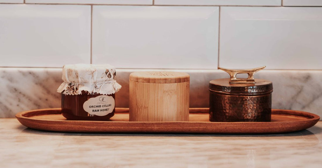 An array of supplement bottles and jars arranged on a wooden shelf, illustrating how to choose all products for UK wellness.
