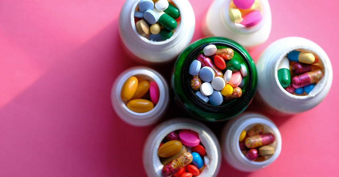 Bottle of multivitamin gummies for adults on a clean surface