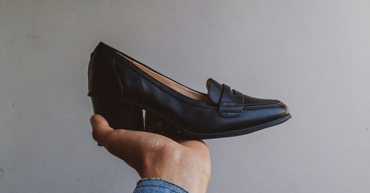 Heel grips for loose shoes on a neutral background