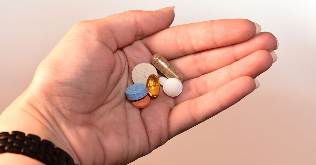 A cluster of glucosamine chondroitin MSM capsules on a clean white surface, representing UK joint health supplements.