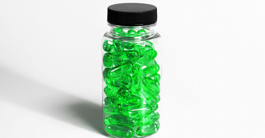Bottle of lutein and zeaxanthin eye health supplement capsules on a clean surface