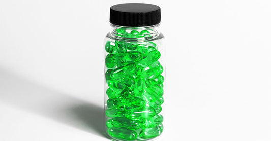 Bottle of lutein and zeaxanthin eye health supplement capsules on a clean surface