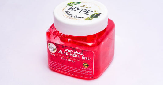 A clear jar of pure aloe vera gel on a light surface, illustrating an aloe vera buying guide UK for long-term skin maintenance.