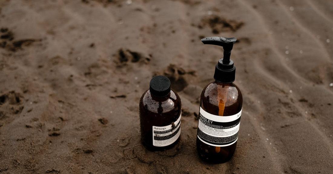 A tube of antifungal cream alongside a shaker bottle of athlete's foot powder, representing athletes foot remedies buying guide essentials.