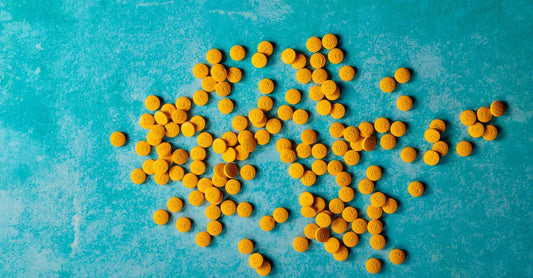 Assortment of top‑rated digestive supplements on a light background, including capsules and tablets representing the best digestive supplements UK 2026.