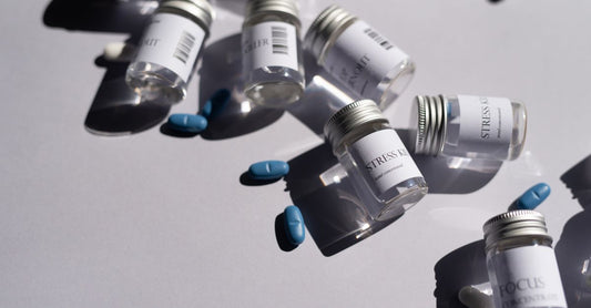 A bottle of calcium supplements on a clean white surface, representing the best calcium UK 2026 options for bone health and absorption.