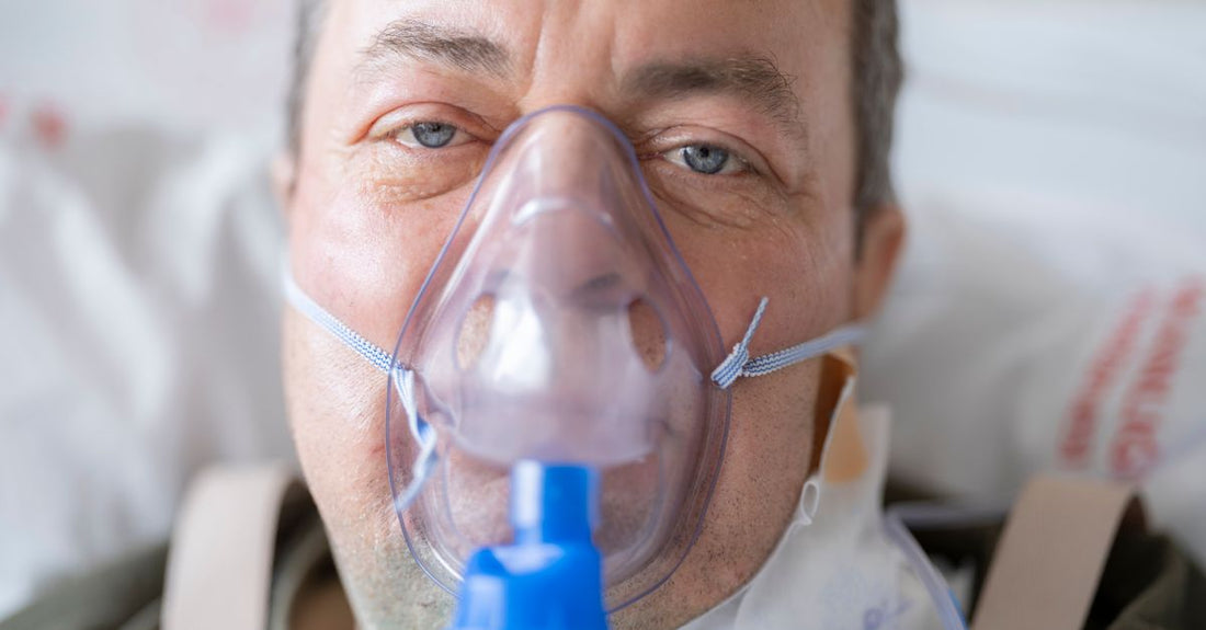 A flat lay of home oxygen therapy equipment including a nasal cannula, transparent tubing, and a connector on a light background, illustrating the best oxygen therapy UK 2026 options.
