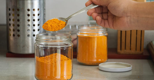 Creatine buying guide UK: jar of pure creatine monohydrate powder on a clean surface