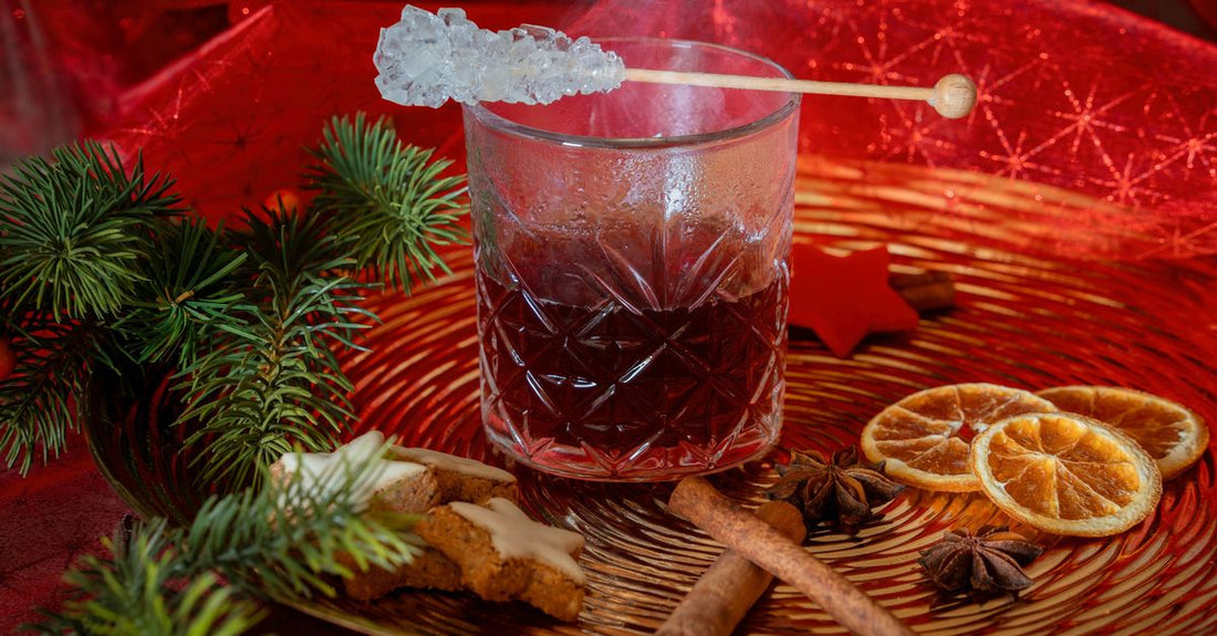 A glass bottle of cinnamon supplement drops beside whole cinnamon sticks on a neutral background, representing the best cinnamon UK 2026 options.