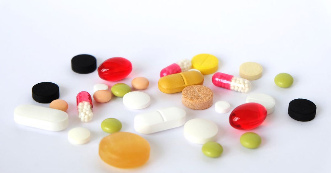 Selection of fat burner supplement capsules on a clean surface, representing best fat burners UK 2026.
