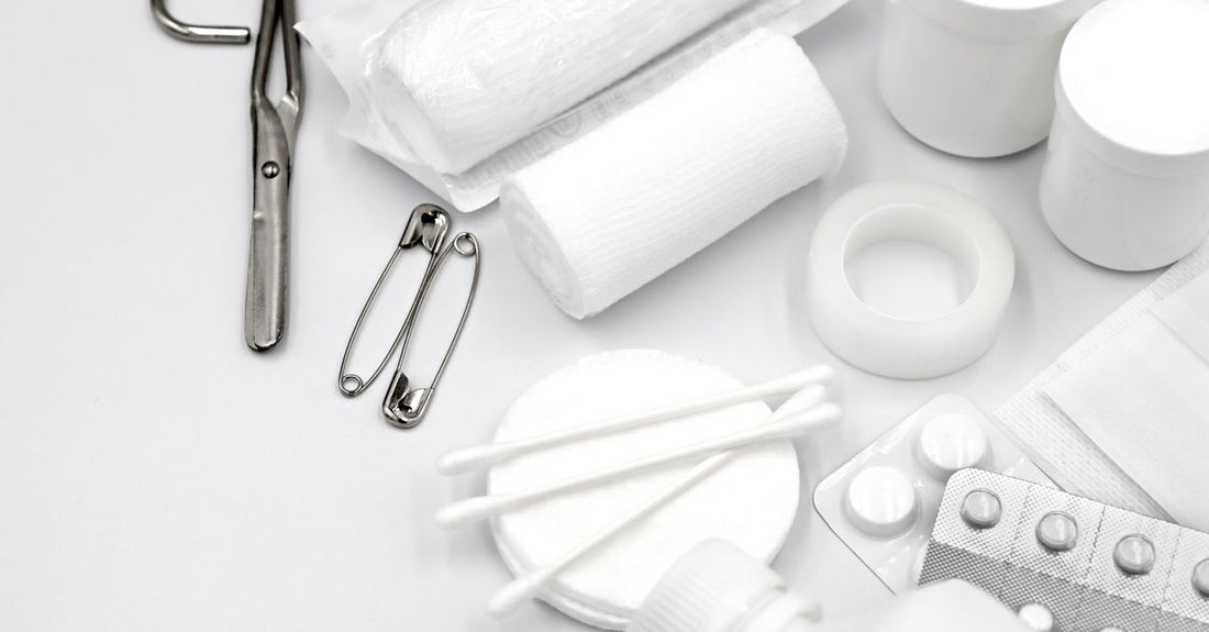 A roll of white hypoallergenic medical tape on a clean surface, ideal for sensitive skin wound care.