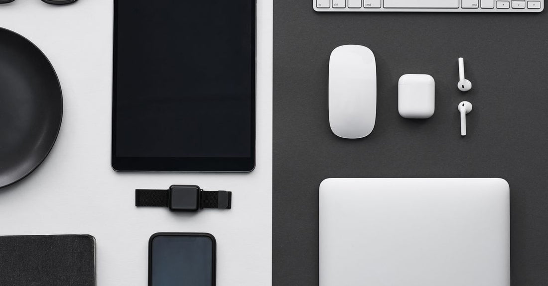 A flatlay of snore reducing aids including a nasal dilator, chin strap, and mouthpiece on a neutral background for a snore reducing aids buying guide UK.