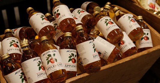 A selection of best fruit extracts UK 2026 supplement bottles arranged on a light background, showcasing different fruit-based nutritional supplements.