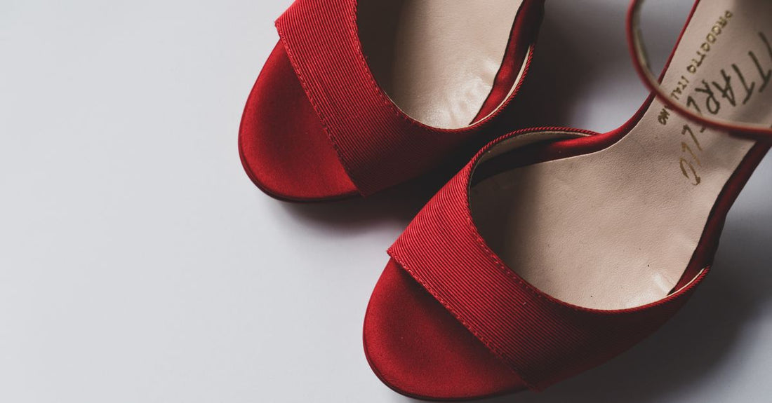 Assorted heel grips for shoes too big on a clean white surface