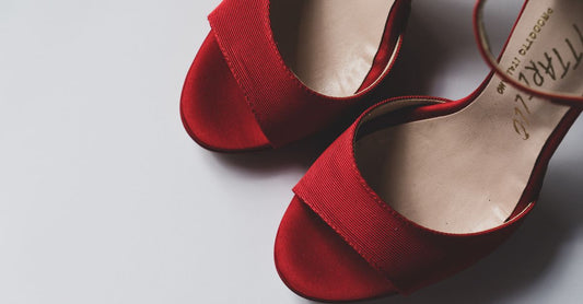 Assorted heel grips for shoes too big on a clean white surface
