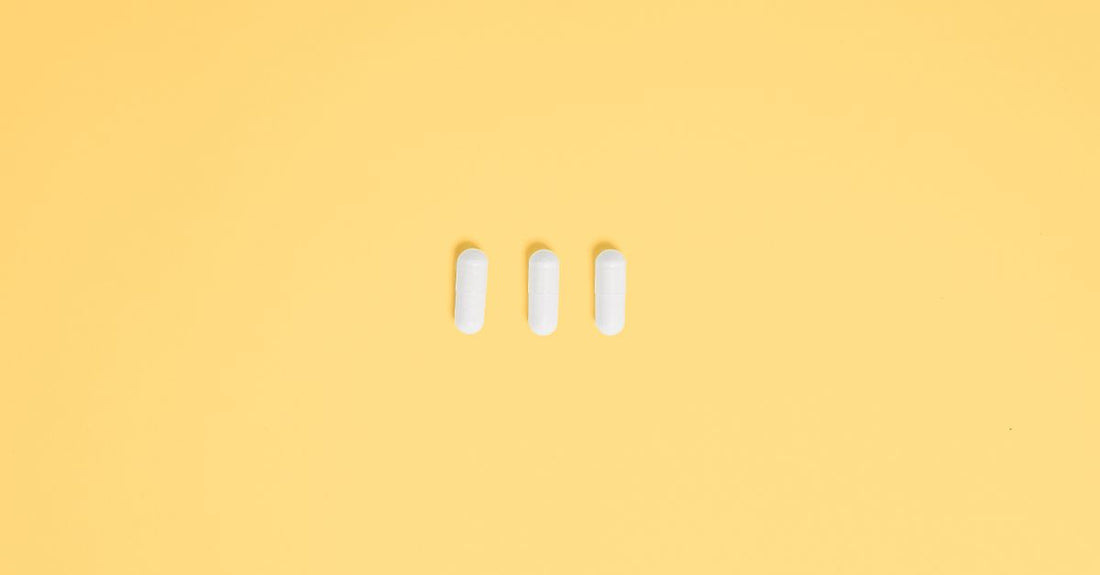 Array of fat burner supplement capsules on a neutral background, fat burners buying guide UK