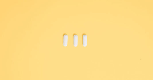 Array of fat burner supplement capsules on a neutral background, fat burners buying guide UK