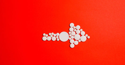 A close-up of lycopene supplement softgels on a clean surface, illustrating lycopene for prostate health.