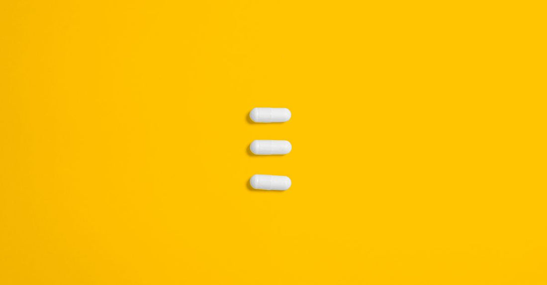 Bottle of best multi-enzymes UK 2026 digestive enzyme capsules on a clean white surface, promoting gut health.