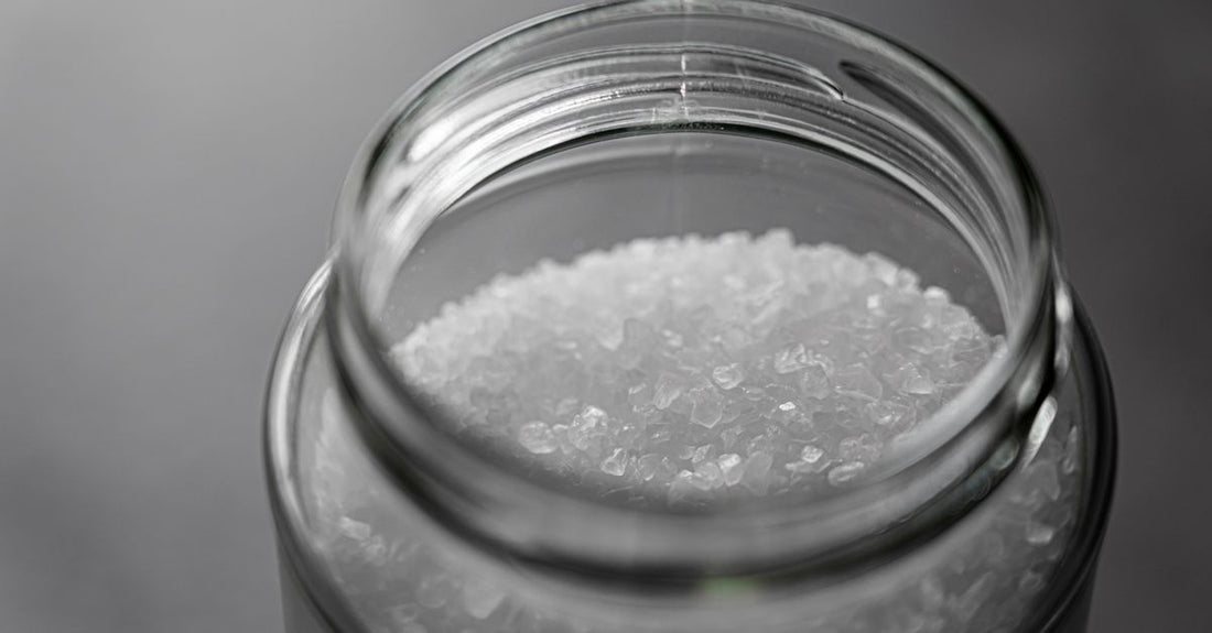 A bottle of inositol supplement capsules on a clean white background, illustrating a b8 (inositol) buying guide.