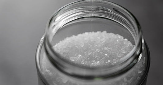 A bottle of inositol supplement capsules on a clean white background, illustrating a b8 (inositol) buying guide.