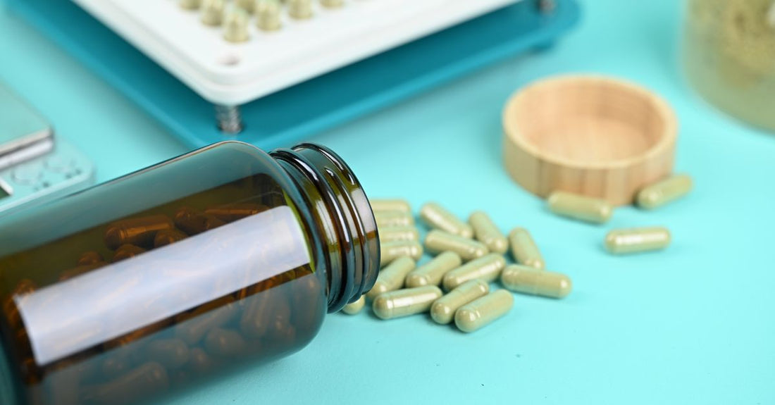 Desiccated beef liver supplements in capsules on a clean white background, showcasing the natural grass-fed product.