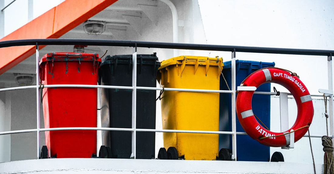 A 1 litre yellow sharps bin with biohazard symbol on a clean surface, representing safe needle disposal at home.