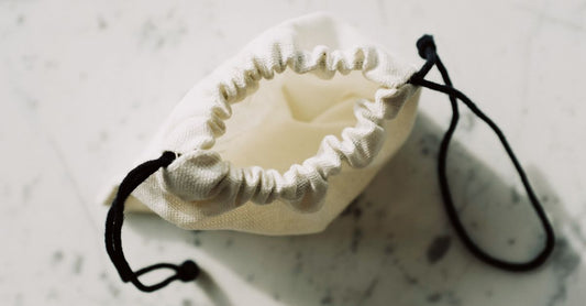 A selection of modern drain pouches and ostomy accessories arranged on a clean surface, illustrating options from a drain pouches buying guide UK.