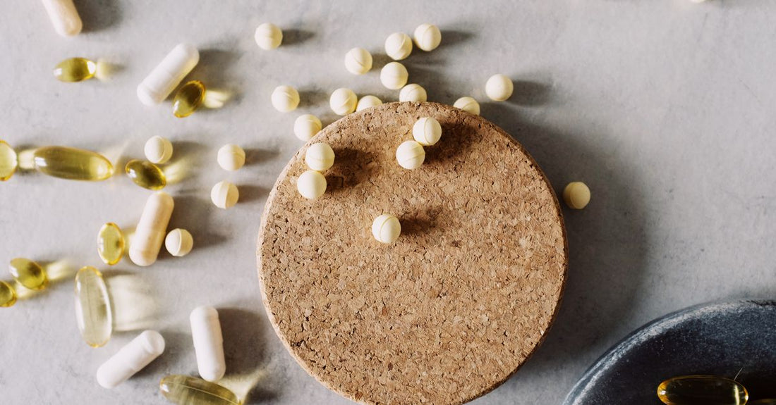 A white bottle of L-lysine capsules on a clean surface, representing how to choose l-lysine UK supplements wisely.