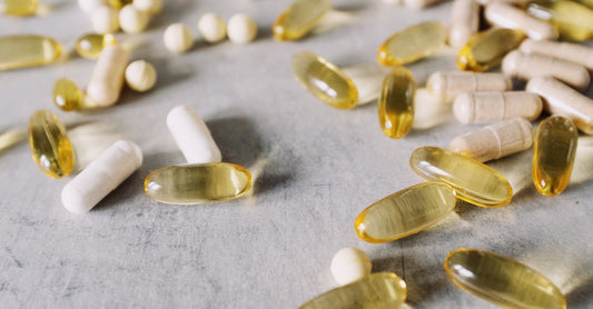 Testosterone booster capsules arranged on a dark surface for a UK buying guide