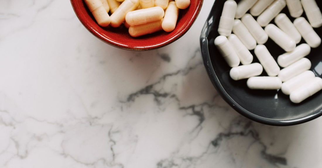 A jar of carb blocker capsules on a white background, ideal for keto diet support.