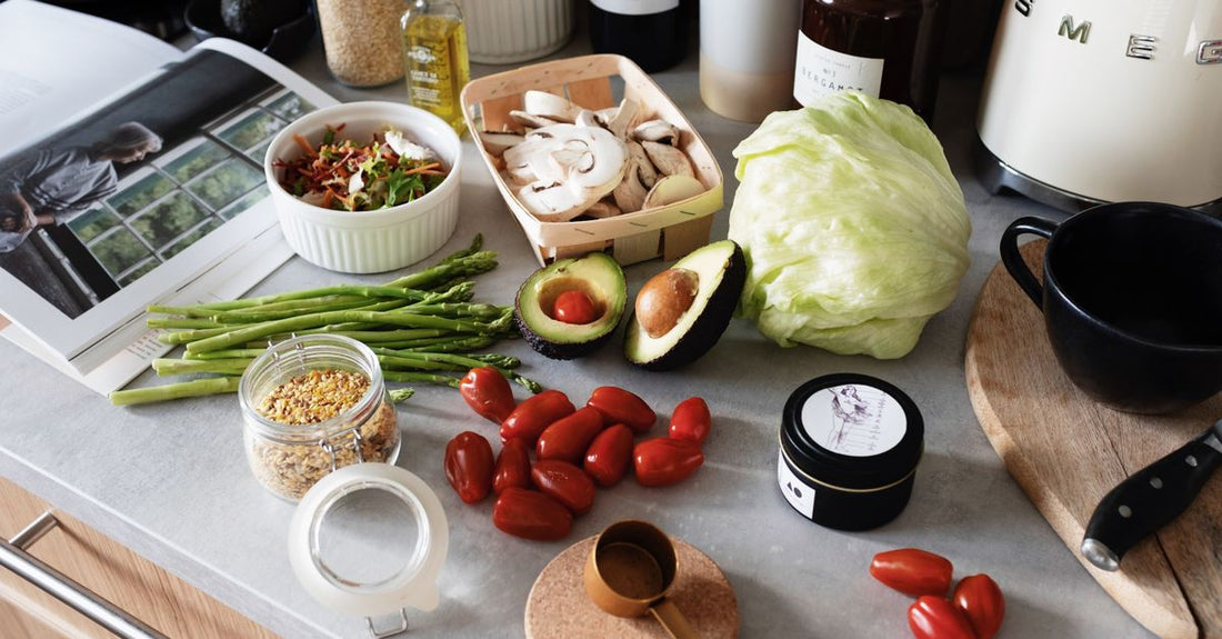 Array of mushroom supplement capsules and powder jars on a neutral background, illustrating how to choose mushrooms UK for daily routines.