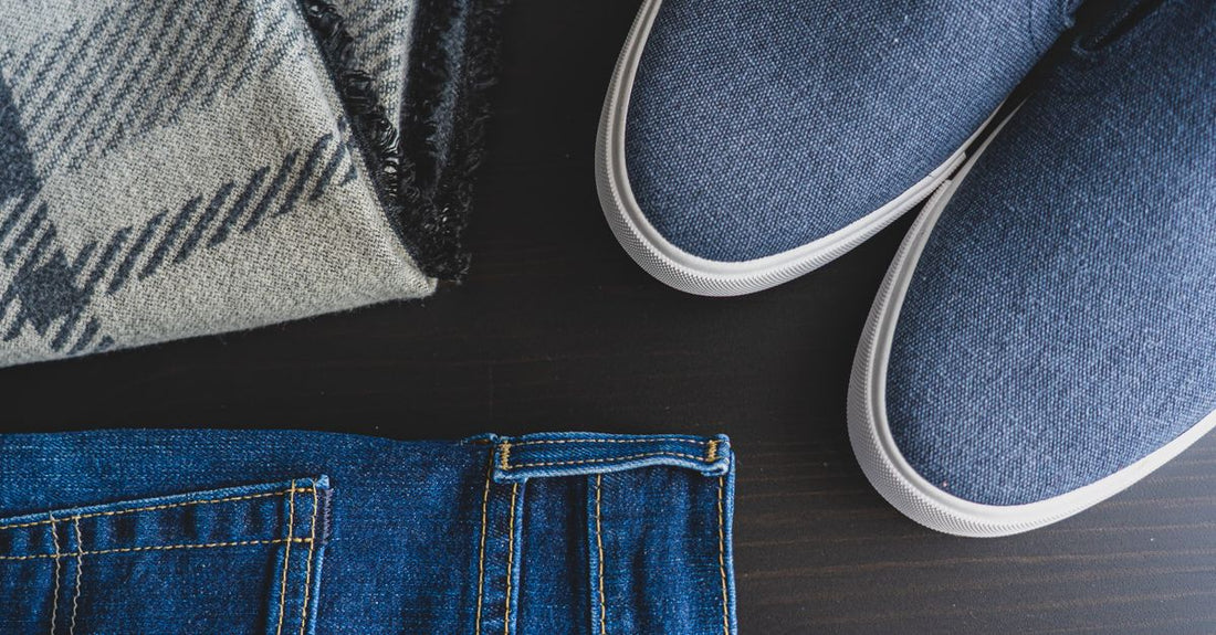 Flatlay of various cotton insoles and socks arranged on a neutral background, illustrating the best socks and insoles UK 2026.