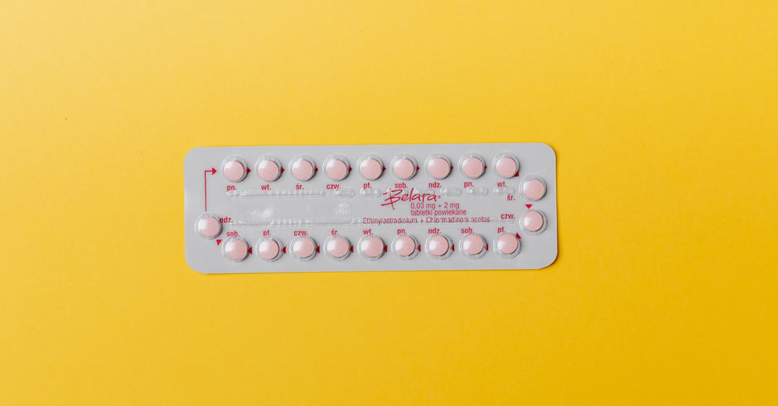 Assorted DIM supplement capsules on a white background, illustrating the best DIM supplements UK 2026.