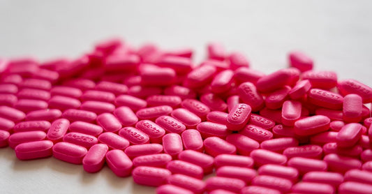 A selection of best b-complex 2026 supplement bottles and capsules arranged on a clean surface.