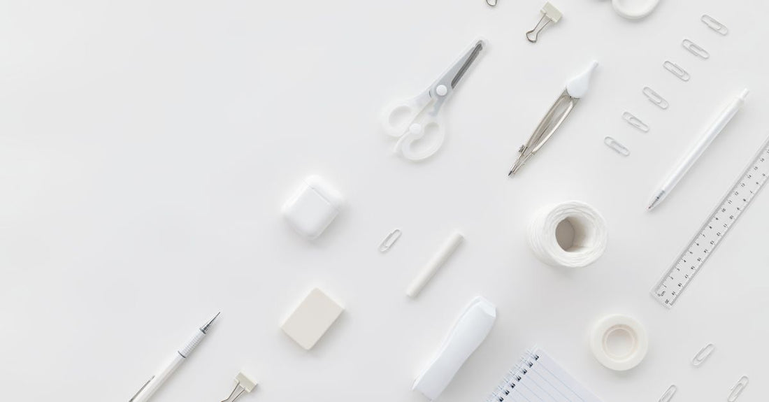 Assorted adhesive bandages laid out on a clean white surface for a buying guide comparison.