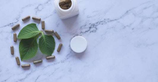 Bottle of andrographis paniculata capsules for immune support on a clean white background