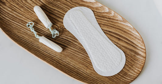 A flatlay of organic cotton tampons in a box, representing the best tampons UK 2026 selection