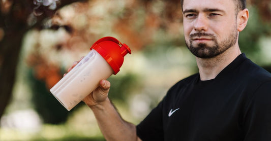 700ml protein shaker bottle on white background, showing mixing ball and leak-proof lid