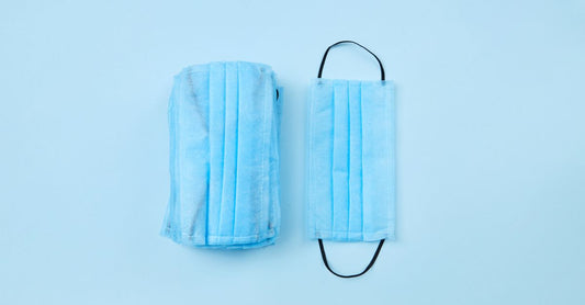 A flatlay of various wipes packs and individual wipes, illustrating how to choose wipes UK