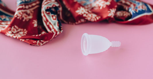 Medical-grade silicone menstrual cups arranged on a clean surface, showcasing the best menstrual cups UK 2026 for long-term value.