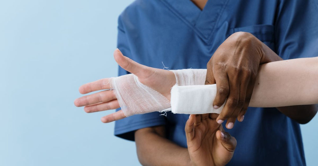 Selection of sterile gauze rolls and pads for first aid wound care, illustrating how to choose gauze UK.