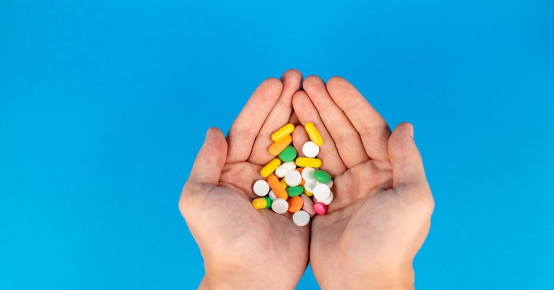 Assortment of antioxidant supplement capsules and softgels on a clean surface, illustrating best antioxidants UK 2026 options