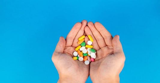 Assortment of antioxidant supplement capsules and softgels on a clean surface, illustrating best antioxidants UK 2026 options