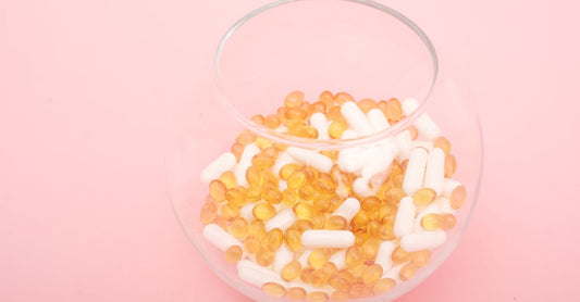 Collagen supplements for hair growth: a jar of collagen peptides next to a scoop on a clean surface