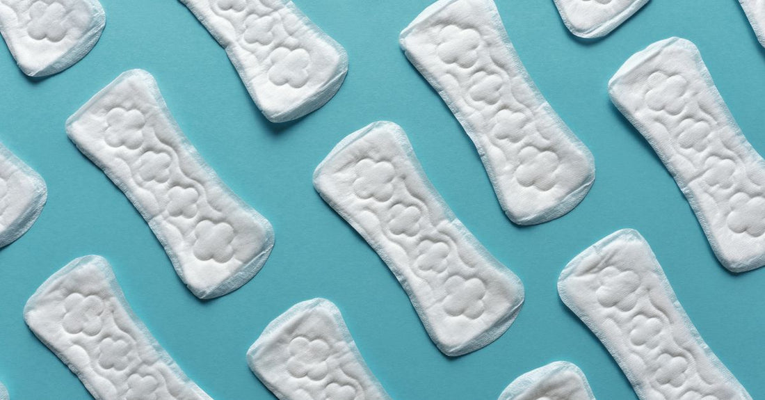 Flatlay of sterile non-stick bandaging pads and first aid supplies for a bandaging pads buying guide UK.